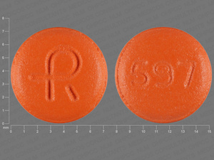Orange Round pill with imprint R;597 — Indapamide Indapamide 1.25 mg; (view 2)