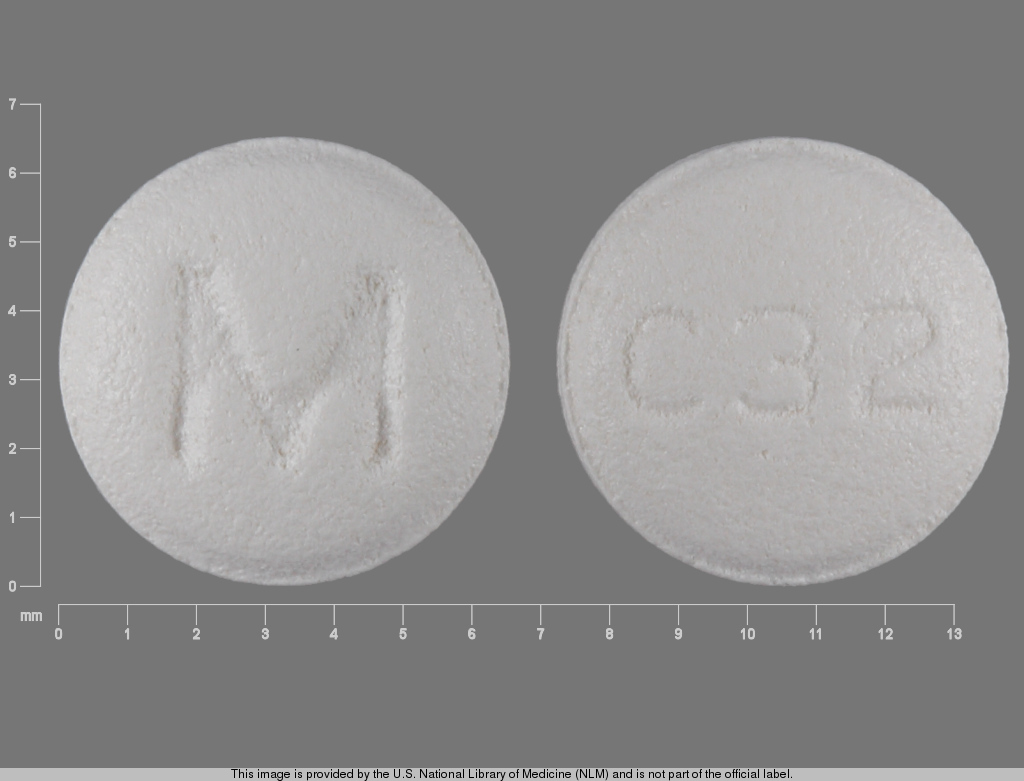 White Round pill with imprint M;C32 — Carvedilol 6.25 mg (view 5)