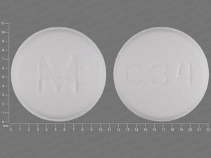 White Round pill with imprint M;C34 — Carvedilol Carvedilol 25 mg; (view 2)