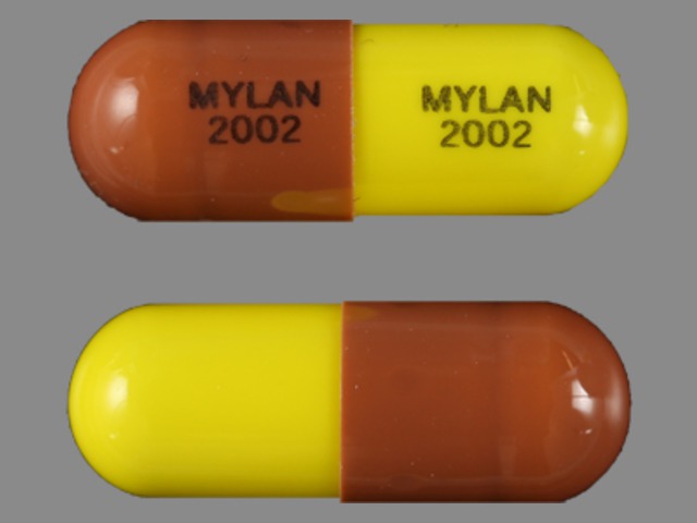 Brown;yellow Capsule pill with imprint MYLAN;2002 — Thiothixene Thiothixene 2 mg; (view 2)