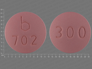 Pink Round pill with imprint b;702;300 — Demeclocycline hydrochloride Demeclocycline hydrochloride 300 mg; (view 2)