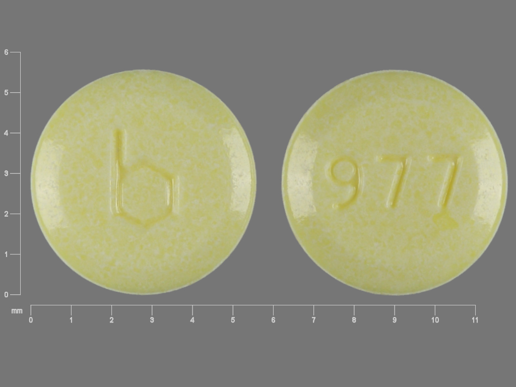 Yellow Round pill with imprint b;977 — Junel Norethindrone acetate 1 mg;ethinyl estradiol 20 ug; (view 3)