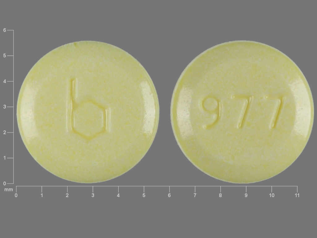 Yellow Round pill with imprint b;977 — Junel Norethindrone acetate 1 mg;ethinyl estradiol 20 ug; (view 2)