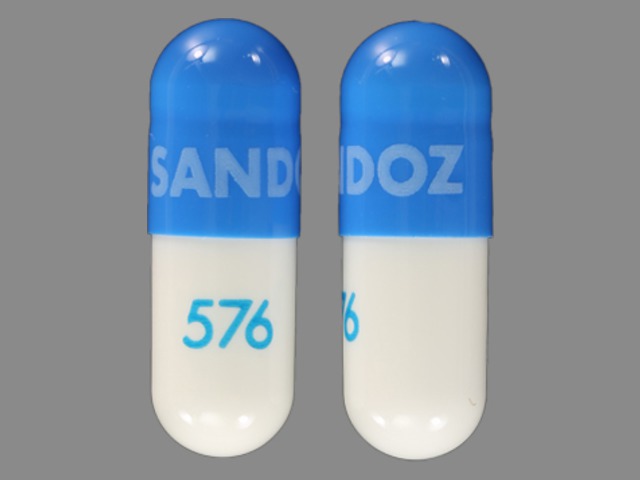 White;blue Capsule pill with imprint SANDOZ;576 — Calcium acetate Calcium acetate 667 mg; (view 7)