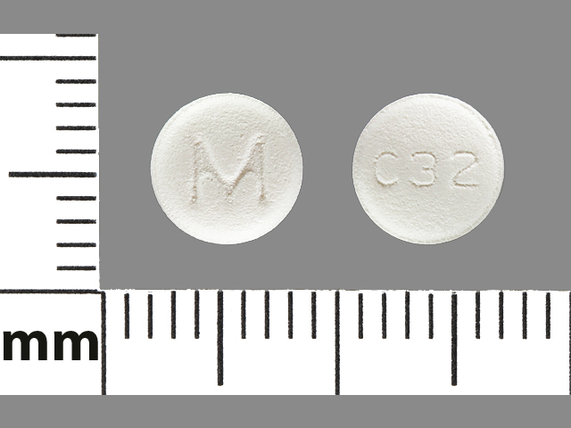 White Round pill with imprint M;C32 — Carvedilol 6.25 mg (view 2)