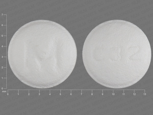 White Round pill with imprint M;C32 — Carvedilol 6.25 mg (view 3)