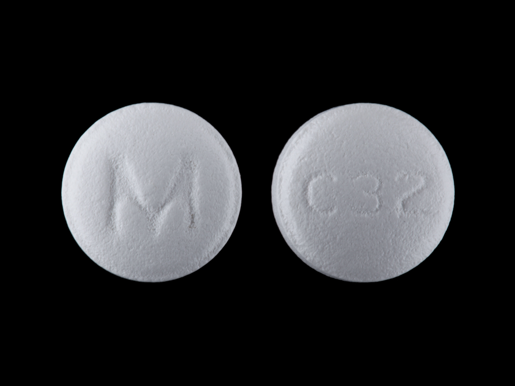 White Round pill with imprint M;C32 — Carvedilol 6.25 mg (view 4)
