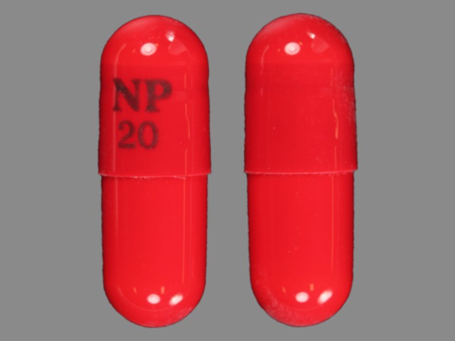 Orange Capsule pill with imprint NP;20 — Piroxicam Piroxicam 20 mg; (view 2)