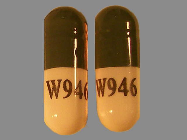 White, gray Capsule pill with imprint W946 — Zonisamide 50 mg (view 2)
