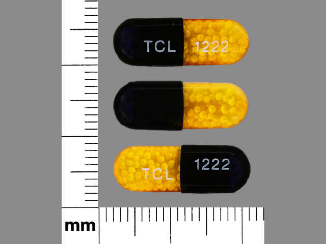 Black, yellow Capsule pill with imprint TCL;1222 — Nitroglycerin 6.5 mg (view 2)