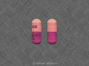 Purple Capsule pill with imprint 606;prilosec10 — Prilosec Omeprazole magnesium 10 mg; (view 2)